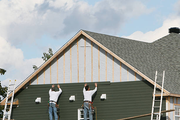 Professional Siding Installation technician working in Simpson, NC